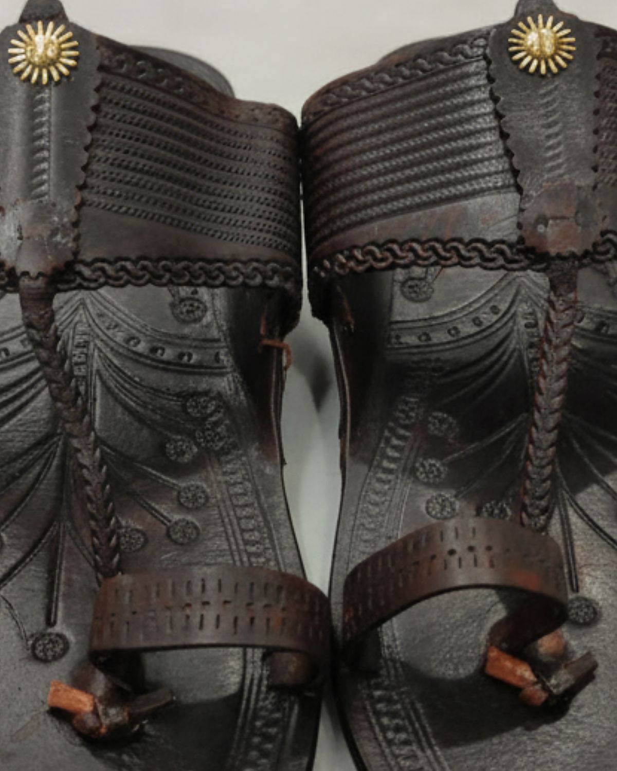 Detail of the braided Kapshi strap and brass rivet