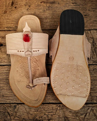 Rajmudra, one shoe turned to show the hand-stamped sole